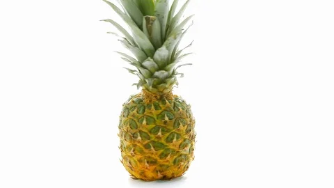Pineapple, exotic tropical fruit isolated on white background. Video stock 110821510