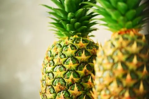 Pineapple fruit background. Close up of tropical pineapples texture. Summer Stock Photos