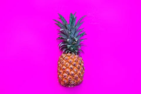 Pineapple fruit on bright colored backgrounds Foto stock