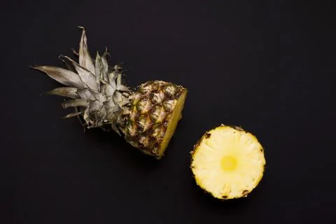 Pineapple. Fruit cut in half to show core Stock Photos