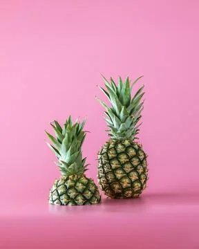 Pineapple fruit isolated on pink background. Stock Photos