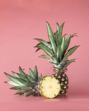 Pineapple fruit isolated on pink background. Stock Photos