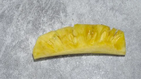 Pineapple fruit slices on gray background with concrete texture Stock Photos