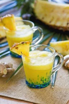 Pineapple with Ginger juice Stock Photos