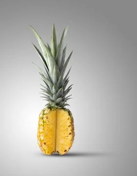 Pineapple on gray color Stock Photos