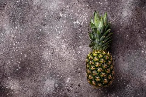 Pineapple on gray concrete background Stock Photos
