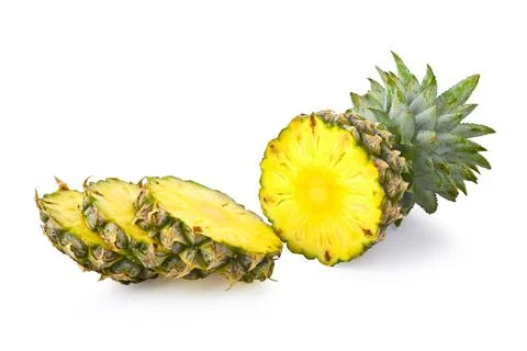 Pineapple half and slice on white background. Stock Photos