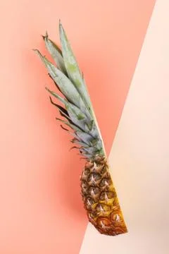 Pineapple half on bright background creative layout, copy space. Flat lay pat Stock Photos