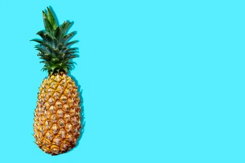 Pineapple isolated on blue surface Foto stock
