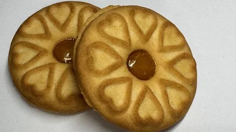 Pineapple jam biscuits, cookie neatly arranged and photographed on a plain .. Stock Photos