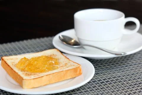 Pineapple jam on bread and coffee Foto stock