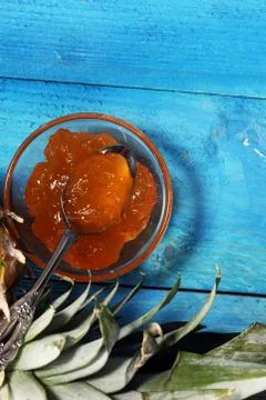 Pineapple jam with fresh pineapple and mint. marmalade on spoon and jar. Stock Photos