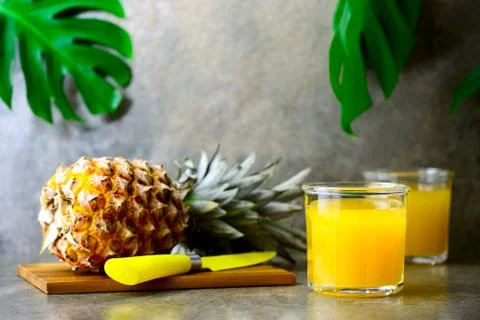 Pineapple juice, front view Stock Photos