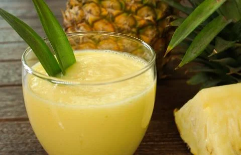 Pineapple juice Stock Photos