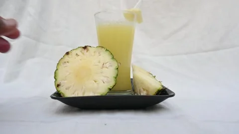 Pineapple juice on white background. 動画素材 326128700