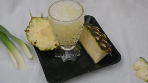 Pineapple juice on white background. 库存影片 326128819