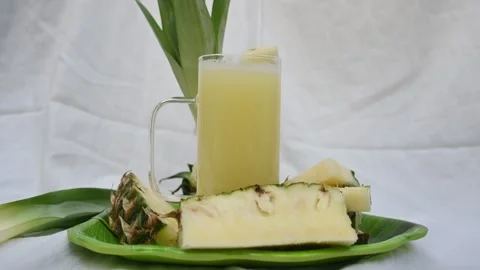 Pineapple juice on white background. Stock Footage 326129375