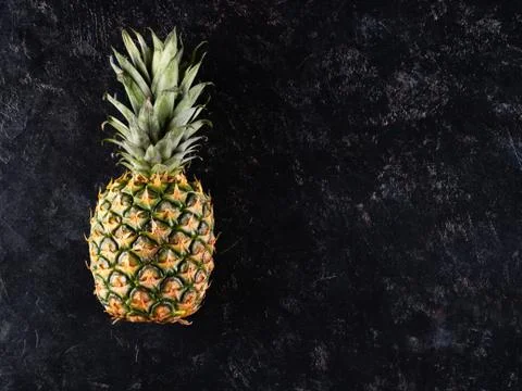 Pineapple lay on back background Stock Photos