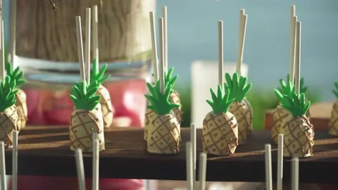 Pineapple lollipops at beach party in Maui Hawaii. Stock Footage 135274053