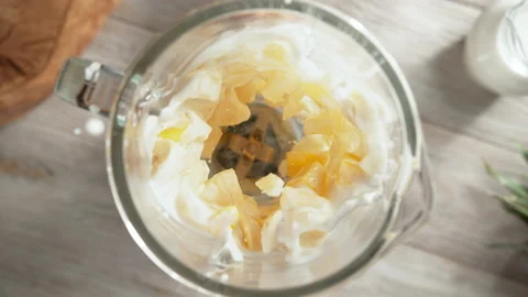 Pineapple, Mango and Banana Shake Mixed in Blender - Top View, Camera Moves Out 스톡 동영상 170958199