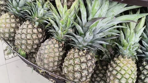 Pineapple or Ananas comosus in supermarket. 库存影片 325299733
