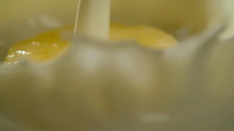 Pineapple piece falling in yogurt slow motion macro Stock Footage 124798200