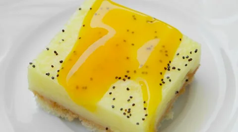 Pineapple pudding with poppy and jam, top view Stock Footage 54338735