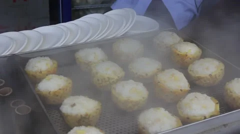 Pineapple rice in the steamer during cooking Stock Footage 48917344