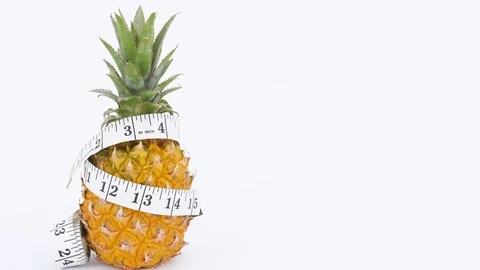 Pineapple rotating on white background Stock Footage 84450320