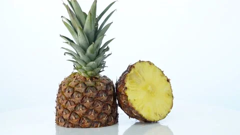 Pineapple rotation on white background Stock Footage 237430554