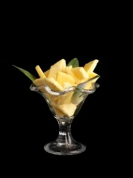 Pineapple salad on black background Stock Photos