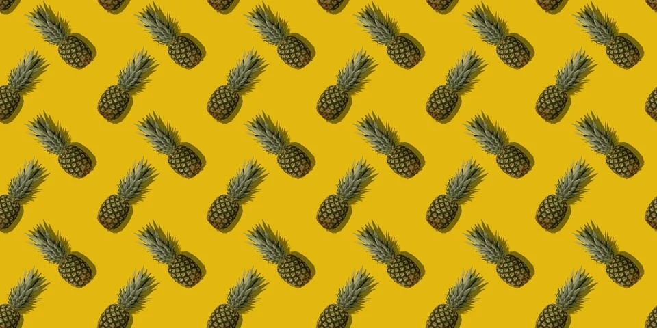 Pineapple with shadow on yellow seamless pattern. Stock Photos