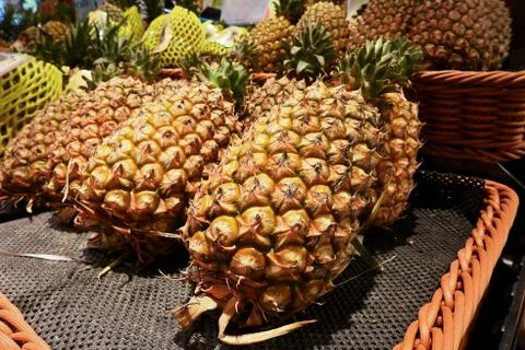Pineapple on shelf Stock Photos