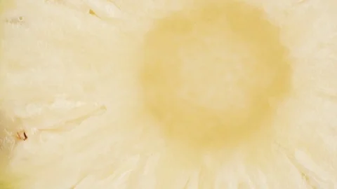 The pineapple slice rotates on the turntable Stock Footage 76547548