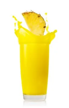 Pineapple slice splash in pineapple juice Stock Photos