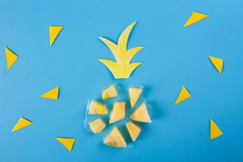 Pineapple slices on the blue background Stock Photos