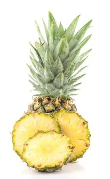 Pineapple with slices an isolated Clipping Path Stock Photos