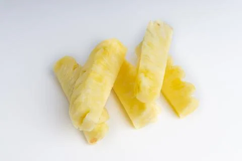 Pineapple with slices isolated on white background 库存照片