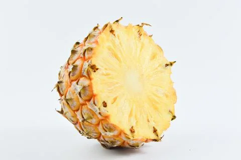 Pineapple slices isolated on a white background. Stock Photos