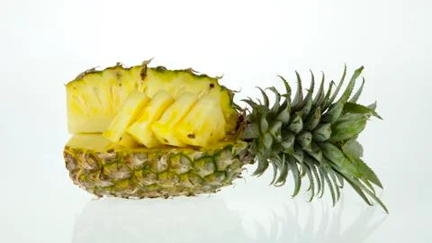 Pineapple with slices isolated on white Foto stock