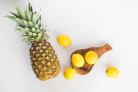Pineapple slices lay flat on white background Stock Photos