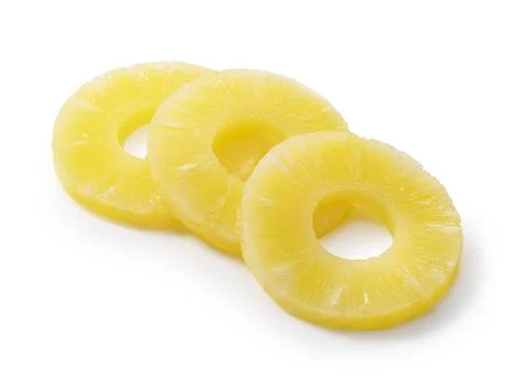 Pineapple slices placed on a white background Stock Photos