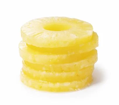 Pineapple slices placed on a white background Stock Photos