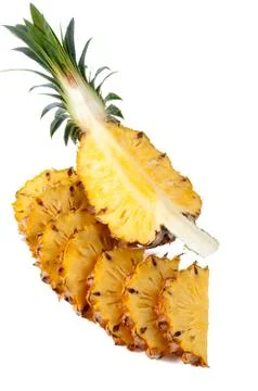 Pineapple with slices on white background Фото
