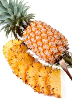 Pineapple with slices on white background Stock-Fotos