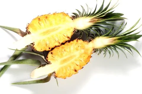 Pineapple with slices on white background 写真素材