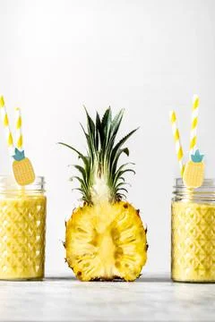 Pineapple smoothie with mini pineapple Stock Photos