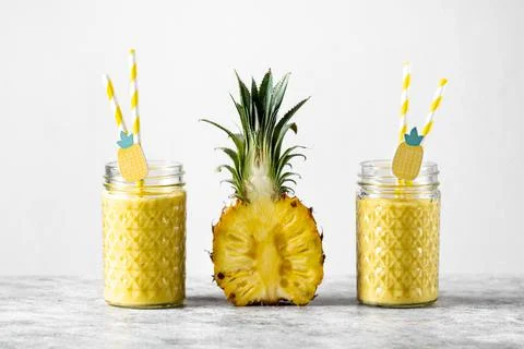 Pineapple smoothie with mini pineapple Stock Photos