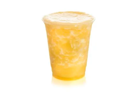 Pineapple smoothie in plastic cup isolated on white Stock Photos