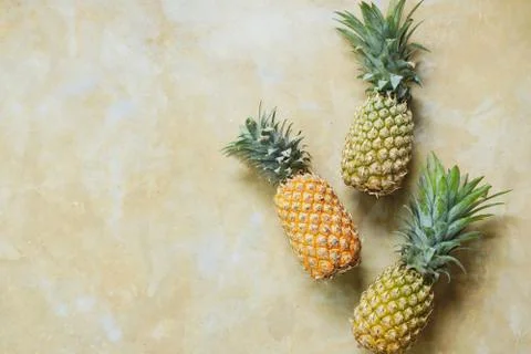 Pineapple on Stone Table Background Top Down View Stock Photos